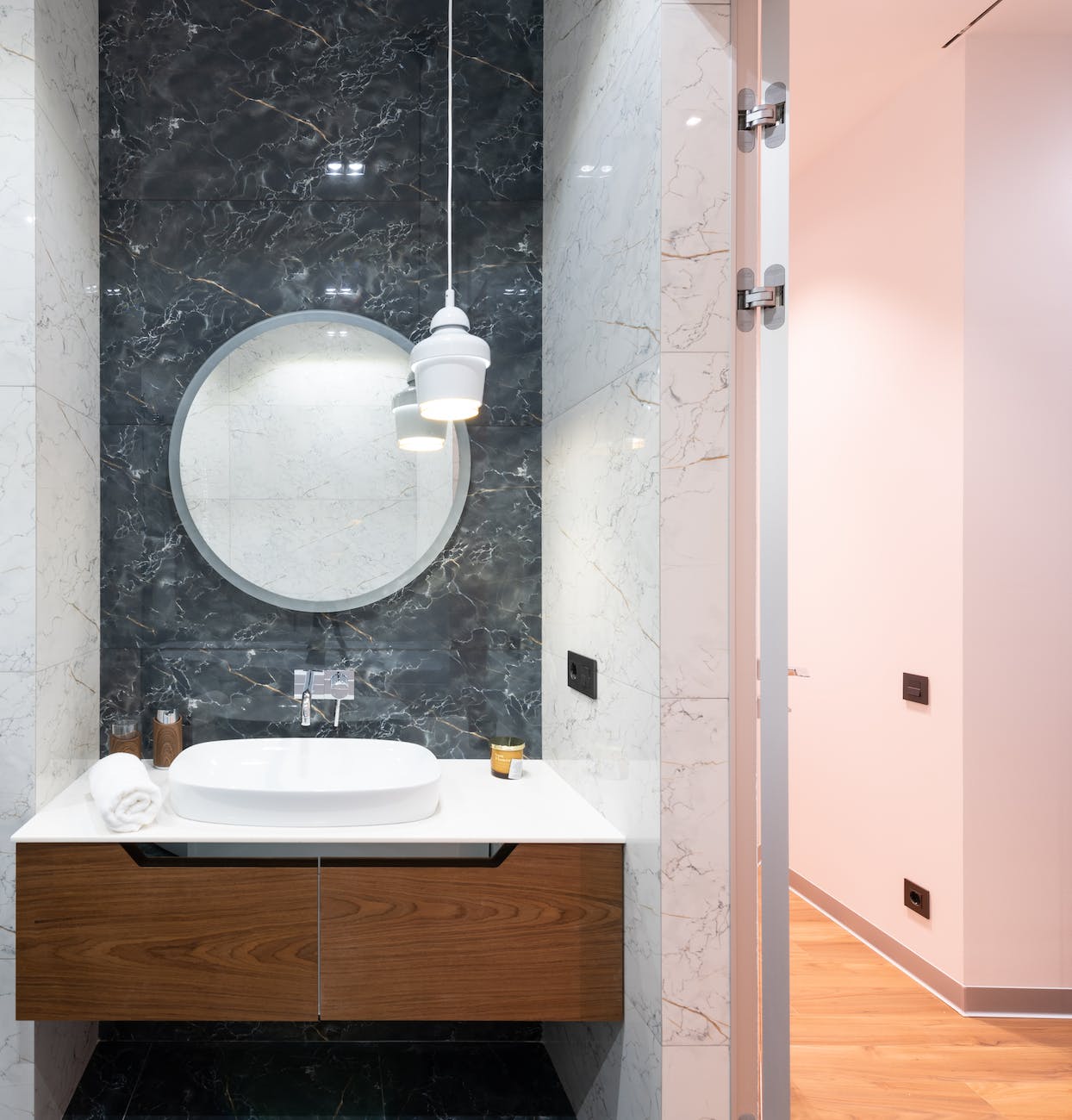 interior of contemporary light bathroom with mirror and sink